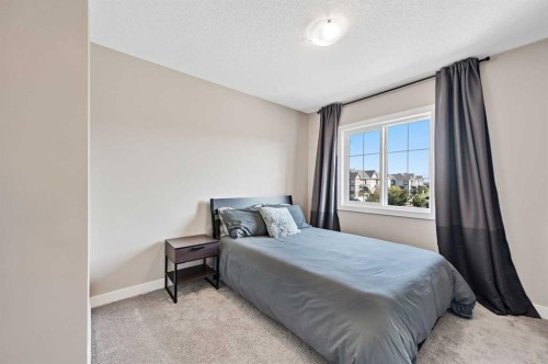 13 Cranbrook Cove Se, Calgary, AB - Indoor Photo Showing Bedroom