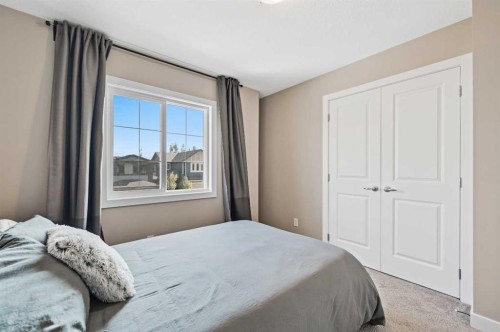 13 Cranbrook Cove Se, Calgary, AB - Indoor Photo Showing Bedroom