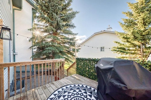 8-122 Bow Ridge Crescent, Cochrane, AB - Outdoor With Deck Patio Veranda