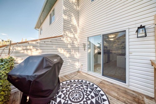 8-122 Bow Ridge Crescent, Cochrane, AB - Outdoor With Exterior