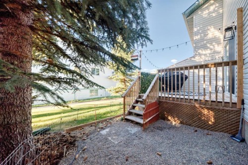 8-122 Bow Ridge Crescent, Cochrane, AB - Outdoor With Deck Patio Veranda