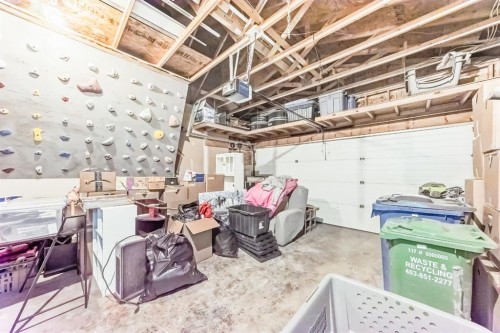 8-122 Bow Ridge Crescent, Cochrane, AB - Indoor Photo Showing Garage