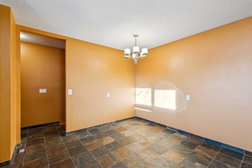 5423 Madigan Drive Ne, Calgary, AB - Indoor Photo Showing Other Room