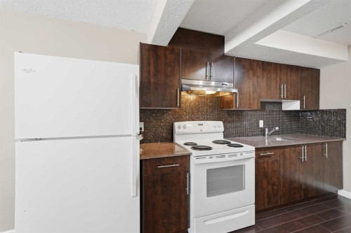 30 Falmere Way Ne, Calgary, AB - Indoor Photo Showing Kitchen