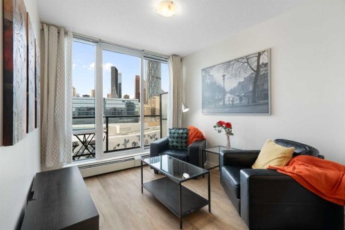 1503-450 8 Avenue Se, Calgary, AB - Indoor Photo Showing Living Room