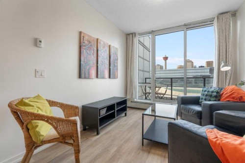 1503-450 8 Avenue Se, Calgary, AB - Indoor Photo Showing Living Room