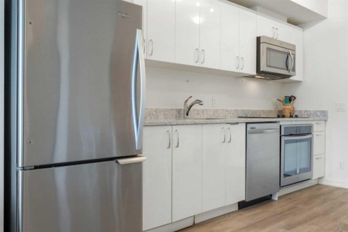 1503-450 8 Avenue Se, Calgary, AB - Indoor Photo Showing Kitchen With Stainless Steel Kitchen With Upgraded Kitchen