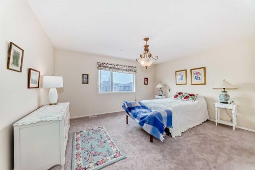 68 Strathlea Close Sw, Calgary, AB - Indoor Photo Showing Bedroom
