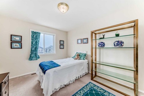 68 Strathlea Close Sw, Calgary, AB - Indoor Photo Showing Bedroom