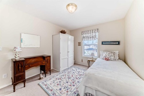 68 Strathlea Close Sw, Calgary, AB - Indoor Photo Showing Bedroom