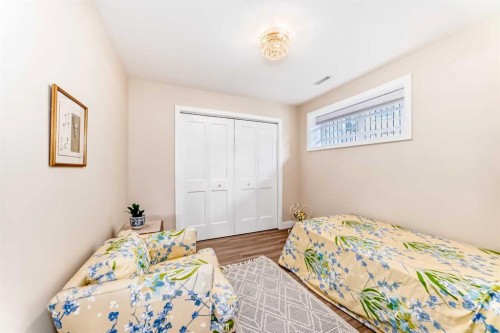 68 Strathlea Close Sw, Calgary, AB - Indoor Photo Showing Bedroom