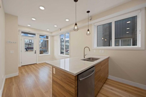 812-10060 46 Street Ne, Calgary, AB - Indoor Photo Showing Kitchen With Double Sink