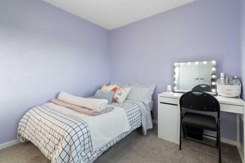 13 Marquis Place Se, Calgary, AB - Indoor Photo Showing Bedroom