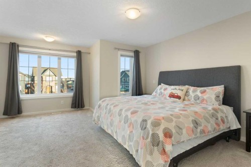 13 Marquis Place Se, Calgary, AB - Indoor Photo Showing Bedroom