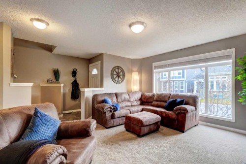 207 Cranford Crescent Se, Calgary, AB - Indoor Photo Showing Living Room
