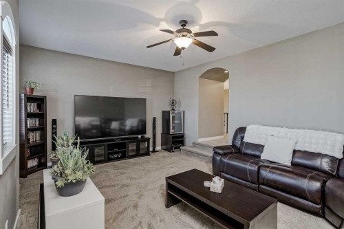 60 Sheep River Heights, Okotoks, AB - Indoor Photo Showing Living Room