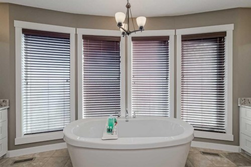 60 Sheep River Heights, Okotoks, AB - Indoor Photo Showing Bathroom