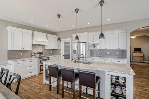 60 Sheep River Heights, Okotoks, AB - Indoor Photo Showing Kitchen With Upgraded Kitchen