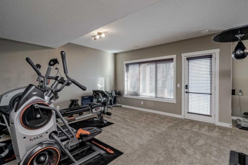 60 Sheep River Heights, Okotoks, AB - Indoor Photo Showing Other Room