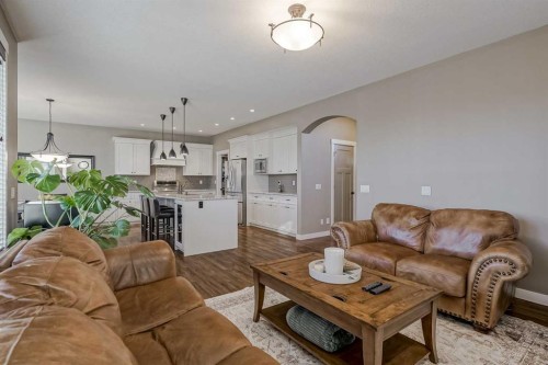 60 Sheep River Heights, Okotoks, AB - Indoor Photo Showing Living Room