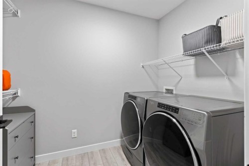 49 Legacy Glen Circle Se, Calgary, AB - Indoor Photo Showing Laundry Room