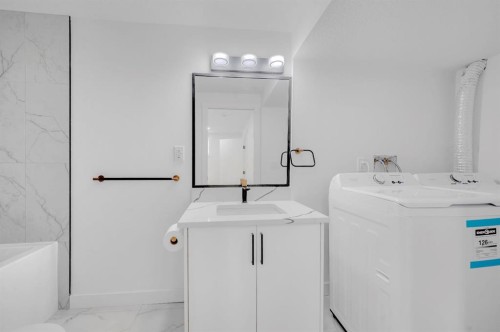 3229 Doverville Crescent Se, Calgary, AB - Indoor Photo Showing Laundry Room