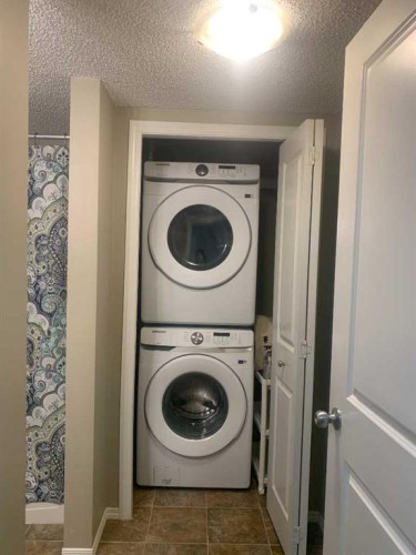 3416-81 Legacy Boulevard Se, Calgary, AB - Indoor Photo Showing Laundry Room