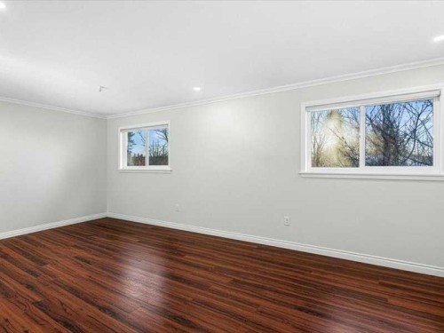 107 Woodford Crescent Sw, Calgary, AB - Indoor Photo Showing Other Room