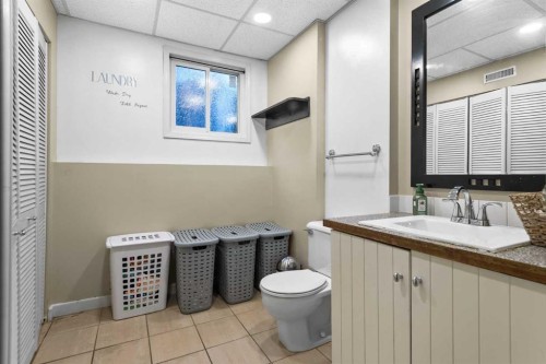 107 Woodford Crescent Sw, Calgary, AB - Indoor Photo Showing Bathroom
