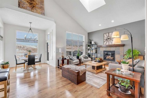 505 Discovery Ridge Boulevard Sw, Calgary, AB - Indoor Photo Showing Living Room With Fireplace