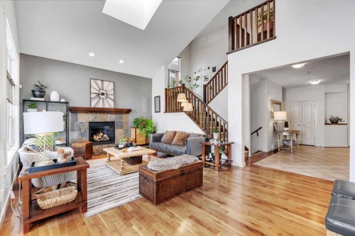 505 Discovery Ridge Boulevard Sw, Calgary, AB - Indoor Photo Showing Living Room With Fireplace