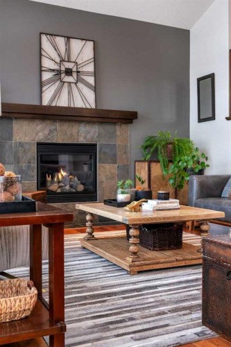 505 Discovery Ridge Boulevard Sw, Calgary, AB - Indoor Photo Showing Living Room With Fireplace