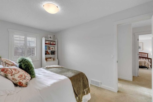 505 Discovery Ridge Boulevard Sw, Calgary, AB - Indoor Photo Showing Bedroom
