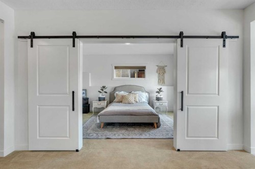 505 Discovery Ridge Boulevard Sw, Calgary, AB - Indoor Photo Showing Bedroom