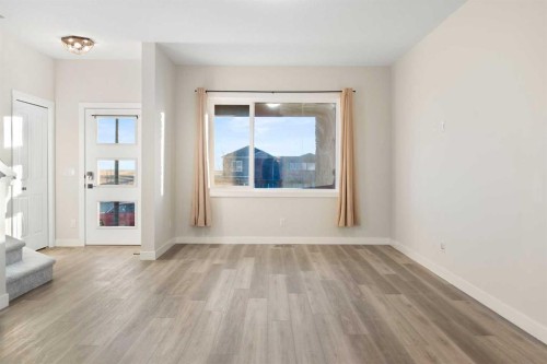 99 Edith Passage Nw, Calgary, AB - Indoor Photo Showing Other Room