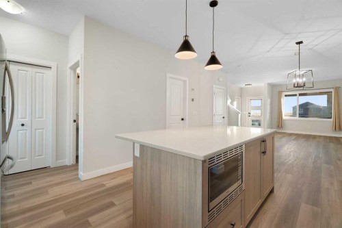 99 Edith Passage Nw, Calgary, AB - Indoor Photo Showing Kitchen