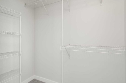 99 Edith Passage Nw, Calgary, AB - Indoor With Storage