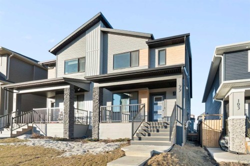 99 Edith Passage Nw, Calgary, AB - Outdoor With Deck Patio Veranda With Facade