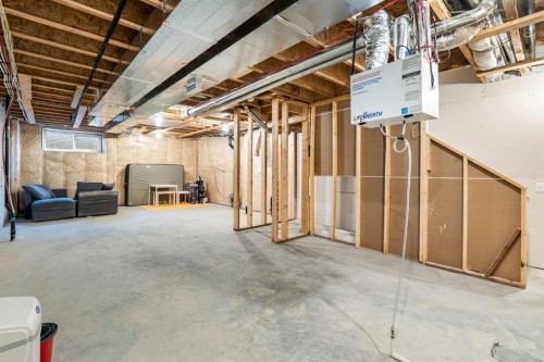 99 Edith Passage Nw, Calgary, AB - Indoor Photo Showing Basement
