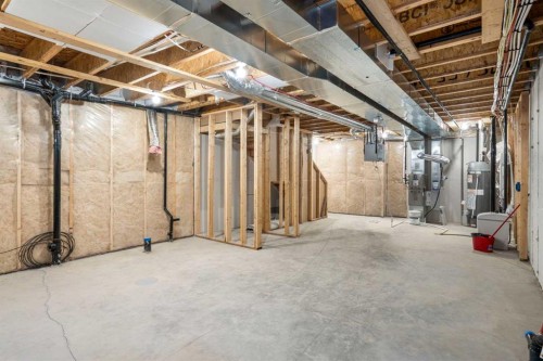 99 Edith Passage Nw, Calgary, AB - Indoor Photo Showing Basement
