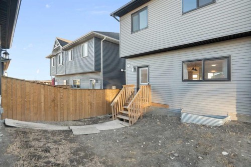 99 Edith Passage Nw, Calgary, AB - Outdoor With Exterior