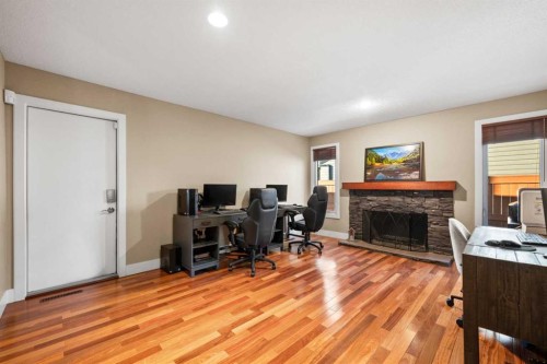 612 Willoughby Crescent Se, Calgary, AB - Indoor With Fireplace