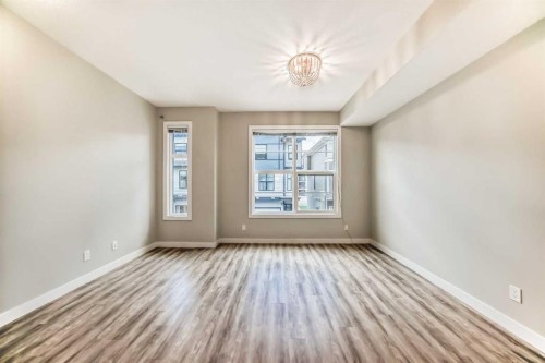58-138 Seton Passage Se, Calgary, AB - Indoor Photo Showing Other Room