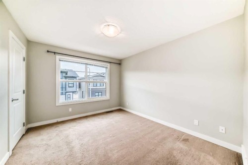 58-138 Seton Passage Se, Calgary, AB - Indoor Photo Showing Other Room