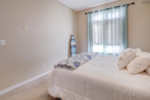 1413-1140 Taradale Drive Ne, Calgary, AB - Indoor Photo Showing Bedroom