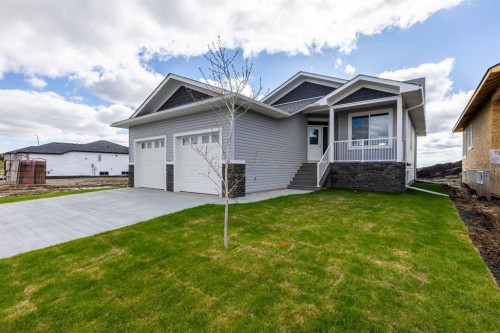 3438 Victory Way, Olds, AB - Outdoor With Facade