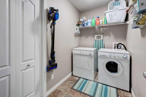 1024 Ranch Road, Okotoks, AB - Indoor Photo Showing Laundry Room