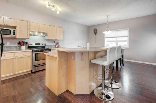 1024 Ranch Road, Okotoks, AB - Indoor Photo Showing Kitchen With Stainless Steel Kitchen