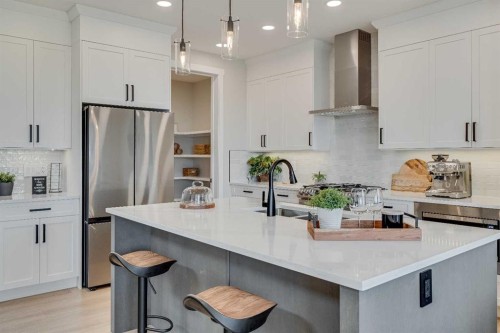 463 Kinniburgh Loop, Chestermere, AB - Indoor Photo Showing Kitchen With Stainless Steel Kitchen With Upgraded Kitchen