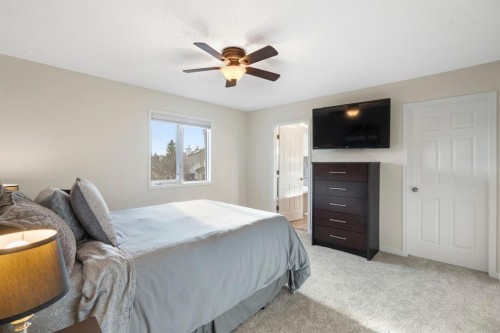 209 Hawkstone Drive Nw, Calgary, AB - Indoor Photo Showing Bedroom